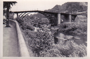 Historic bridge over a calm river