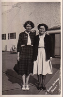Two friends joyfully in retro outfits