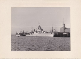 1950s naval ships docked at port