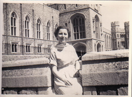 Smiling woman enjoying a sunny day at the castle