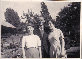 Gathering of friends in a sunny garden setting