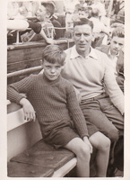 Father and son sharing a moment on a boat trip