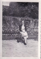 Woman enjoys a sunny day in the garden outdoors