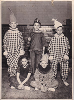Kids in bright costumes at a party