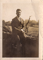 Classic charm of a young man in a serene field