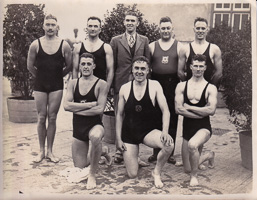 Historic swim team poses proudly in vintage attire