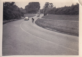 Cyclist rides a winding vintage road