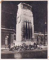 Floral tributes on night clock tower