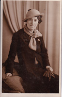 Vintage-clad woman posing elegantly