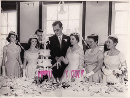 Joyful celebration of love with a wedding cake