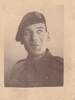 Portrait of a soldier in uniform with a warm smile