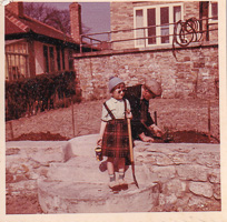 Little gardener in the yard sharing joyful moments