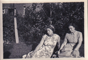 Two friends enjoying a sunny day in the garden