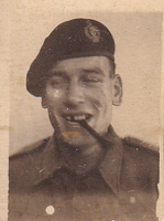 Soldier enjoying a moment with a pipe in hand