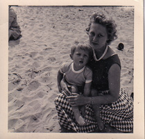 Mother and child enjoying a sunny beach day