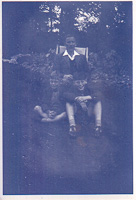 Family gathering in an old garden setting