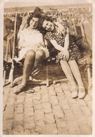 Friends enjoy a sunny day by the beach