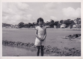 Young girl enjoying a sunny day at the beach