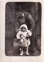 Joyful moments of a child and caregiver in winter