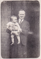 Happy moment between father and baby in the sun