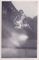 Joyful family moments in a grassy yard