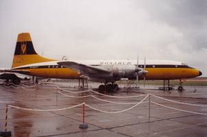 Vintage aircraft resting at the airport terminal