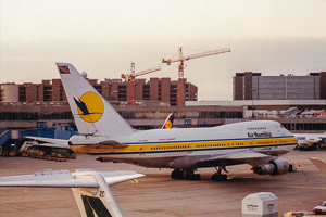 Air Namibia aircraft at busy airport terminal