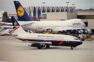 Busy airport with classic planes
