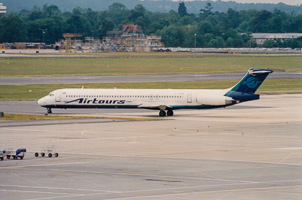 Airplane preparing for departure on a sunny day