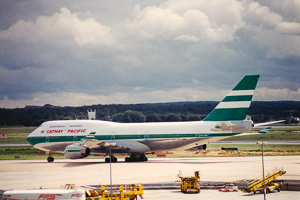 Airliner prepares for takeoff under cloudy skies