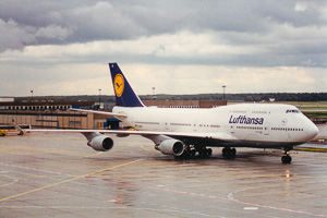 Lufthansa jumbo jet prepares for takeoff at dusk