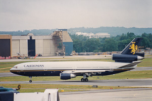 Jet taxiing on runway at an airport in summer