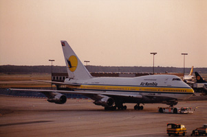 Airliner takes off at sunset
