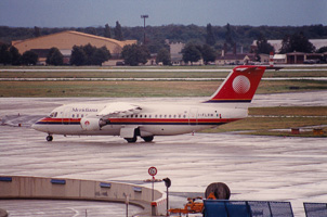 Vintage aircraft on a rainy runway in action