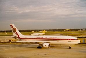 Airplanes taxiing at the sunny airport