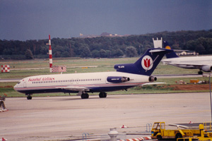 Planes taxiing under dramatic skies