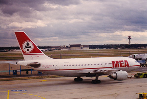 Old jet at the airport under cloudy skies