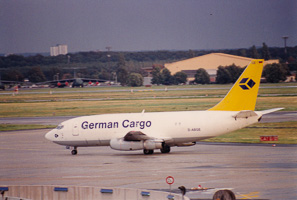Vintage cargo plane at the runway during sunset