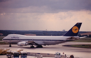 Lufthansa jet takes off under dramatic skies