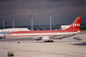 Vintage aircraft on the tarmac at sunset time
