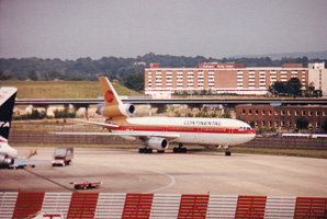 Continental Airlines aircraft on runway during day