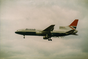 Majestic aircraft gliding through cloudy skies