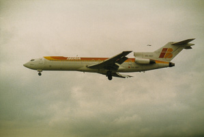 Vintage Iberia aircraft flies through clouds