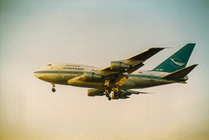 Majestic aircraft gliding through golden skies