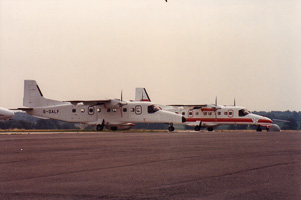 Vintage aircraft parked at the local airfield