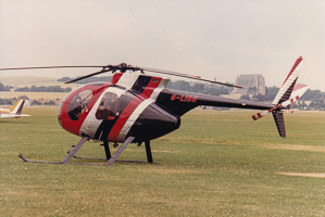 Helicopter poised for flight on a bright day