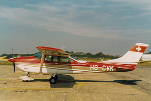 Vintage Swiss airplane parked at an airport