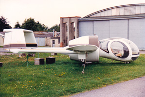 Vintage helicopter on display at an airfield