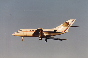 Jet approaching runway during golden hour