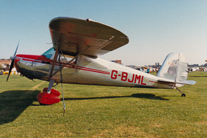 Classic airplane on the runway at summer air show